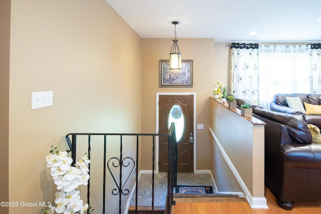 99 Fiddlers Ln, Colonie, NY 12110 - entryway with baseboards and wood finished floors