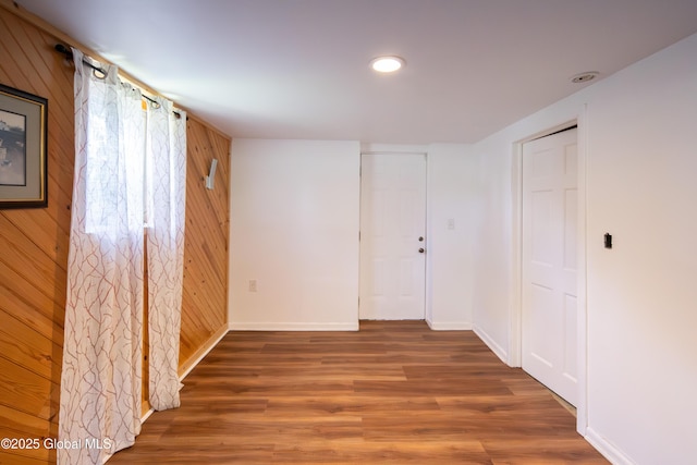 99 Fiddlers Ln, Colonie, NY 12110 - unfurnished room with wood walls, wood finished floors, and recessed lighting
