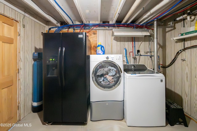 99 Fiddlers Ln, Colonie, NY 12110 - laundry room with washing machine and dryer and wood walls
