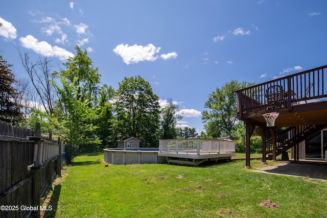 99 Fiddlers Ln, Colonie, NY 12110 - view of yard with a deck, an outdoor pool, and stairs