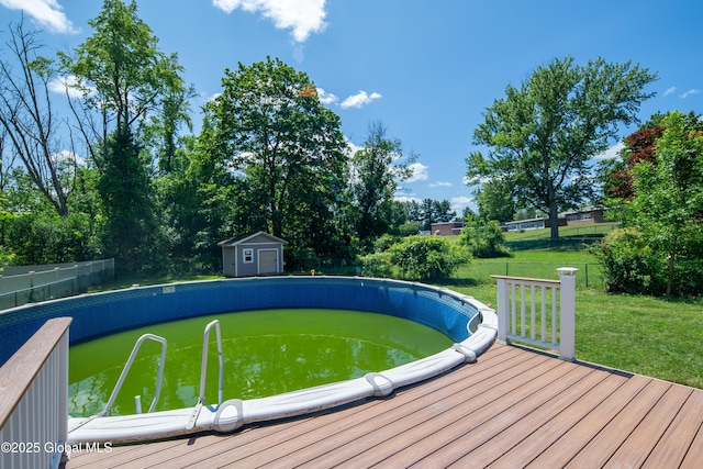 99 Fiddlers Ln, Colonie, NY 12110 - outdoor pool with a storage shed and a deck