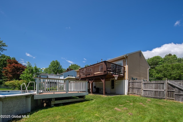 99 Fiddlers Ln, Colonie, NY 12110 - rear view of house with a deck and a gate