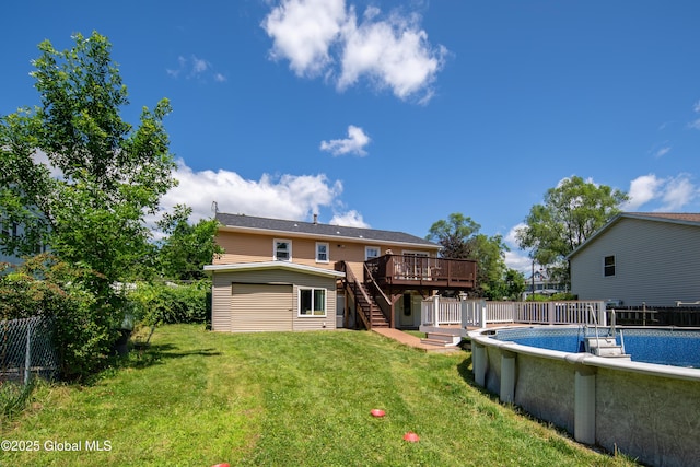 99 Fiddlers Ln, Colonie, NY 12110 - rear view of house with a wooden deck and stairway