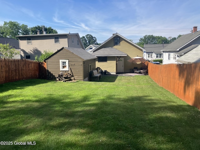 56 Pershing Dr, Scotia, NY 12302 - back of house featuring a storage unit and a fenced backyard
