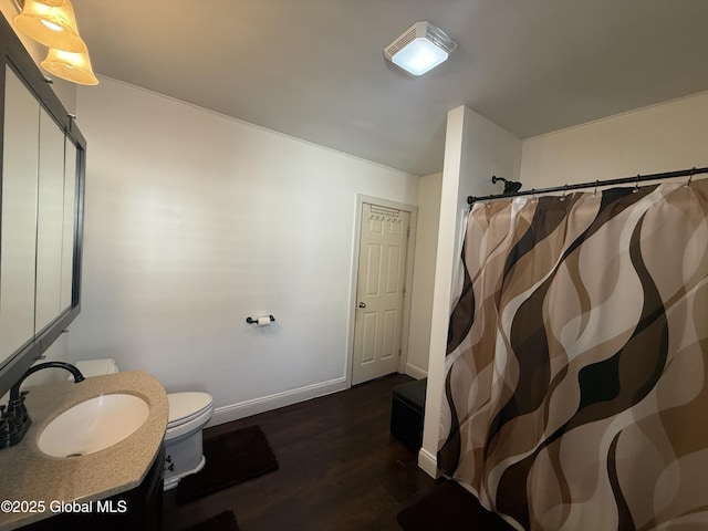 56 Pershing Dr, Scotia, NY 12302 - bathroom with wood finished floors, vanity, and a shower with shower curtain