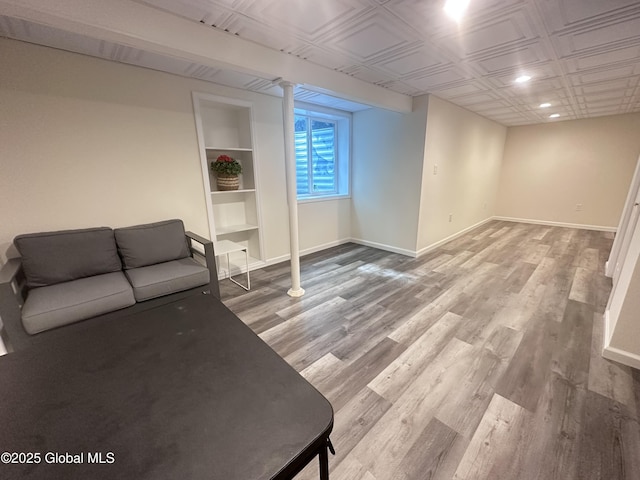 30B Idared Ln, Halfmoon, NY 12065 - below grade area featuring wood finished floors, an ornate ceiling, recessed lighting, and built in features