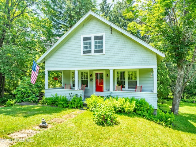 3063 Ny Highway 43, Sand Lake, NY 12018 - view of front facade featuring a porch and a front yard