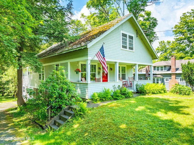 3063 Ny Highway 43, Sand Lake, NY 12018 - bungalow-style home with a porch and a front yard