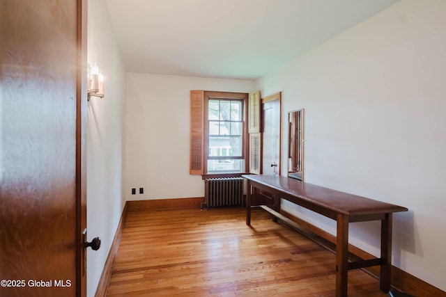 3063 Ny Highway 43, Sand Lake, NY 12018 - corridor with radiator heating unit and light wood-style flooring