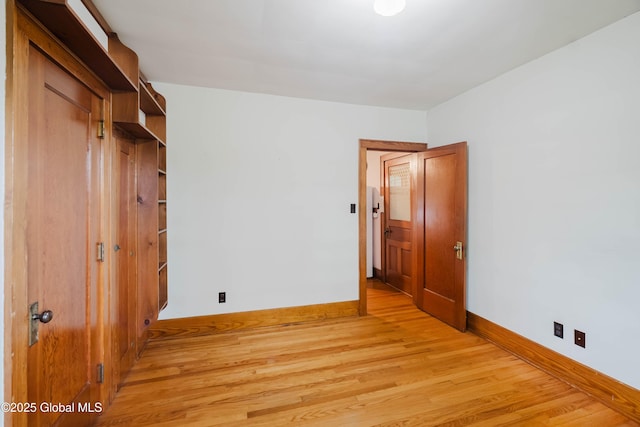 3063 Ny Highway 43, Sand Lake, NY 12018 - unfurnished bedroom with light wood-type flooring and baseboards