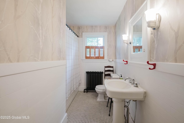 3063 Ny Highway 43, Sand Lake, NY 12018 - bathroom with radiator and tile walls