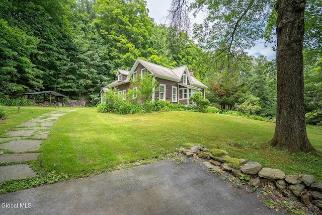 203 Center Rd, White Creek, NY 12057 - view of grassy yard with a wooded view