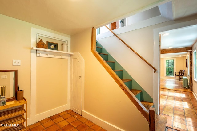 203 Center Rd, White Creek, NY 12057 - stairs featuring tile patterned flooring and baseboards
