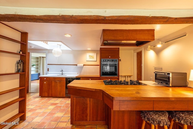 203 Center Rd, White Creek, NY 12057 - kitchen with butcher block counters, black appliances, open shelves, brown cabinetry, and recessed lighting