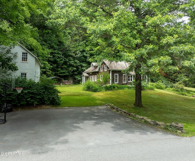 203 Center Rd, White Creek, NY 12057 - view of front of house featuring a front lawn