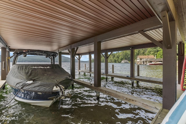 55 Trinity Rock Rd, Lake George, NY 12845 - dock area featuring boat lift and a water view