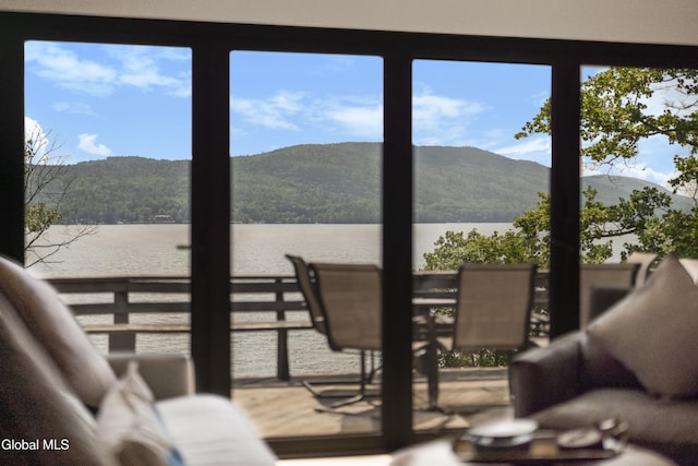 55 Trinity Rock Rd, Lake George, NY 12845 - sunroom with a water and mountain view