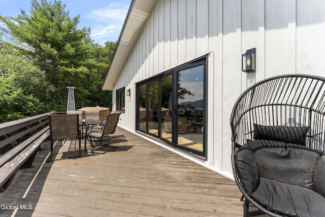 55 Trinity Rock Rd, Lake George, NY 12845 - wooden deck with outdoor dining space
