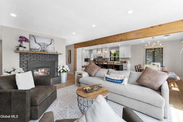 55 Trinity Rock Rd, Lake George, NY 12845 - living area featuring light wood-style flooring, recessed lighting, and a brick fireplace