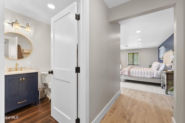 55 Trinity Rock Rd, Lake George, NY 12845 - bathroom with wood finished floors, vanity, and recessed lighting