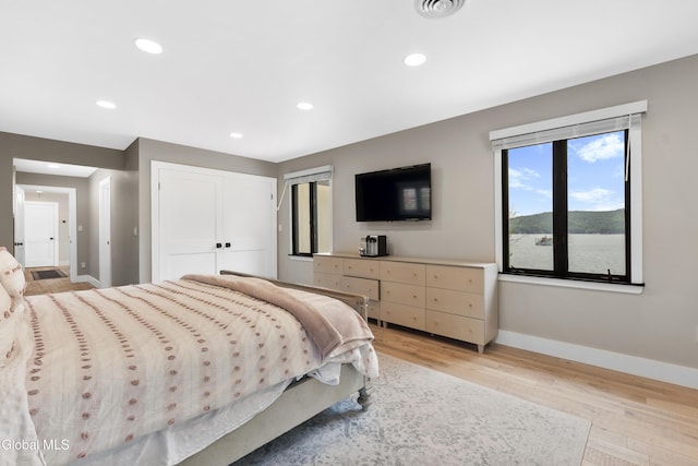 55 Trinity Rock Rd, Lake George, NY 12845 - bedroom with light wood-style floors, recessed lighting, and a closet
