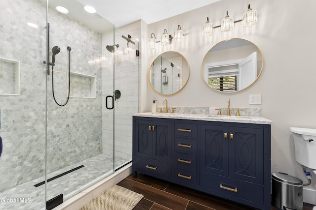 55 Trinity Rock Rd, Lake George, NY 12845 - full bathroom featuring a shower stall, double vanity, and wood tiled floors