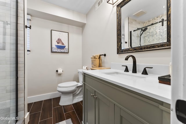 55 Trinity Rock Rd, Lake George, NY 12845 - full bath featuring vanity, tiled shower, and wood tiled floors