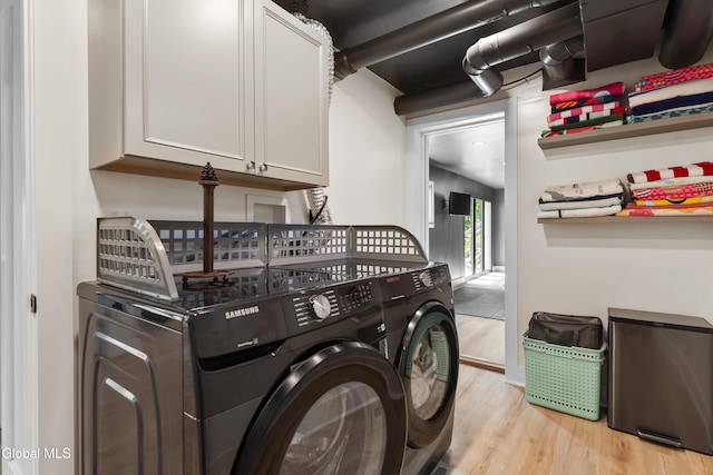 55 Trinity Rock Rd, Lake George, NY 12845 - laundry area featuring independent washer and dryer, cabinet space, and light wood finished floors