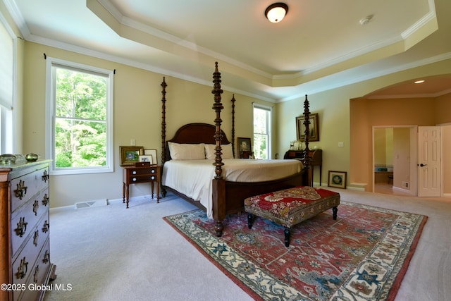 96 Masters Cmn N, Queensbury, NY 12804 - bedroom with a raised ceiling, light carpet, arched walkways, and ornamental molding