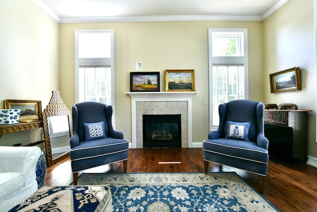 96 Masters Cmn N, Queensbury, NY 12804 - living area with wood-type flooring, ornamental molding, and a tiled fireplace
