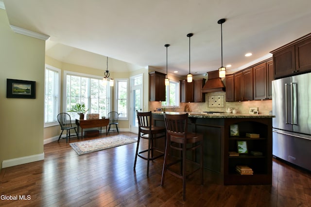 96 Masters Cmn N, Queensbury, NY 12804 - kitchen with high end refrigerator, open shelves, premium range hood, dark wood-style floors, and decorative backsplash