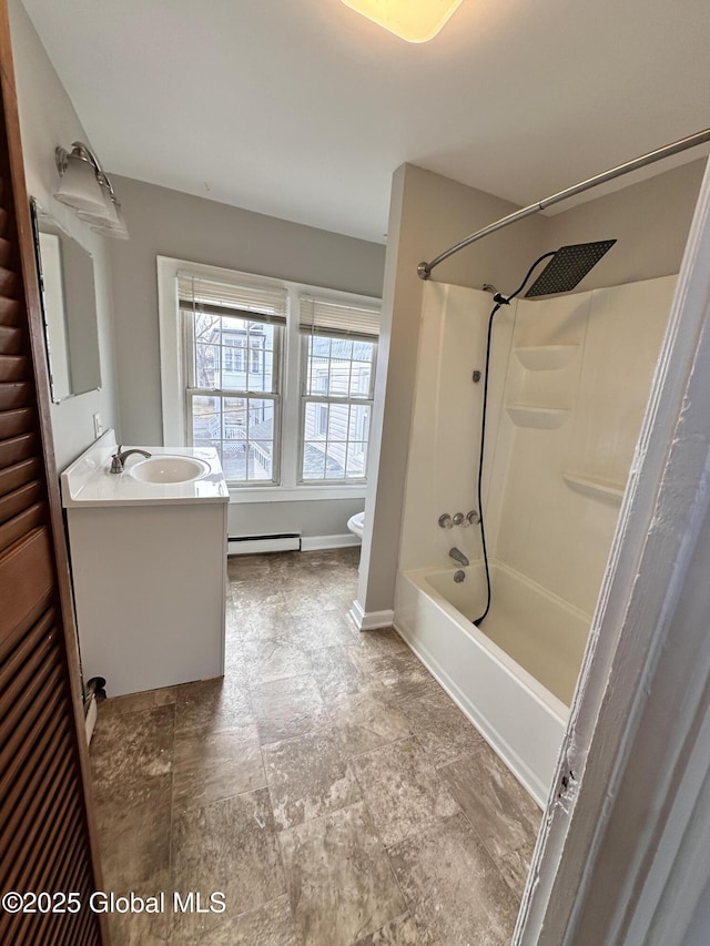 1 S Main St, Voorheesville, NY 12186 - full bathroom featuring baseboard heating, vanity, stone finish flooring, and shower / bathtub combination