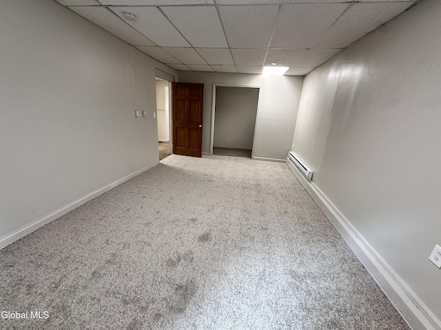 1 S Main St, Voorheesville, NY 12186 - empty room with a drop ceiling, carpet floors, a baseboard radiator, and a smoke detector