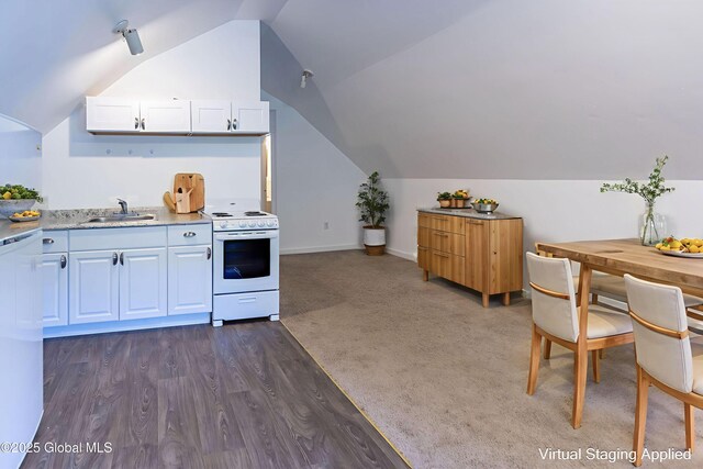 17564 State Route 22, Berlin, NY 12022 - kitchen featuring white range with electric stovetop, lofted ceiling, white cabinets, and dark wood finished floors