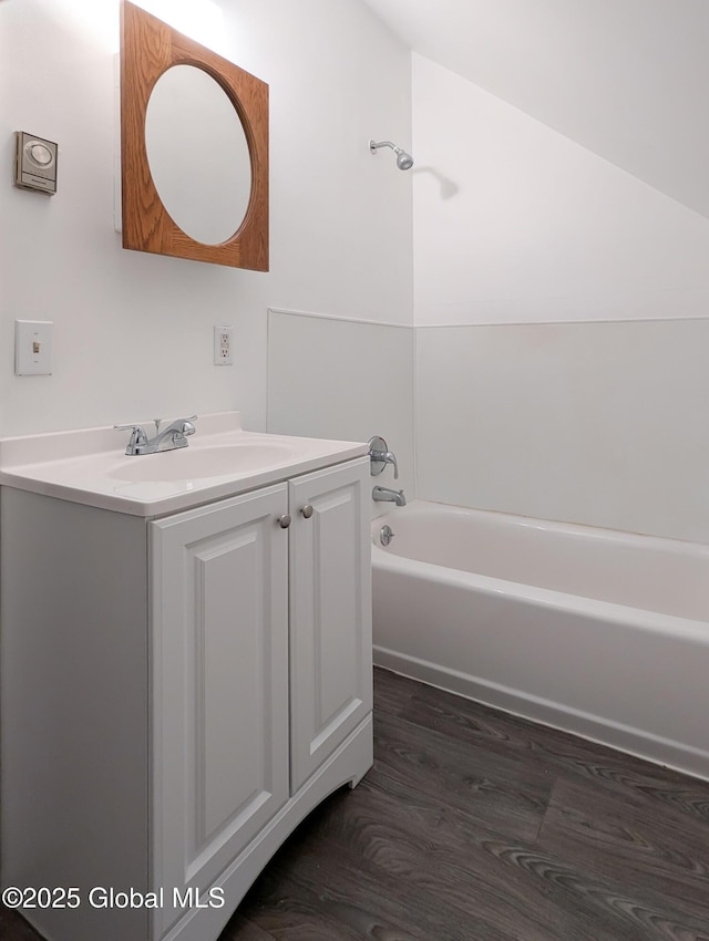 17564 State Route 22, Berlin, NY 12022 - full bathroom featuring vanity, wood finished floors, and shower / tub combination