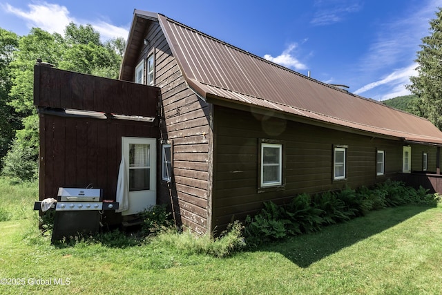 17564 State Route 22, Berlin, NY 12022 - view of property exterior featuring a yard, a metal roof, and a gambrel roof