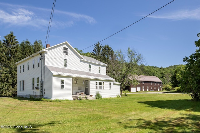 17564 State Route 22, Berlin, NY 12022 - back of house featuring a lawn and a chimney
