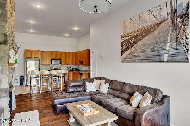 8 Trailside Dr Unit B10, Hunter, NY 12442 - living room with a towering ceiling, dark wood-style floors, and recessed lighting