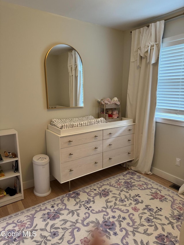 32 Winnie St, Albany, NY 12208 - bedroom featuring dark wood-style flooring and baseboards