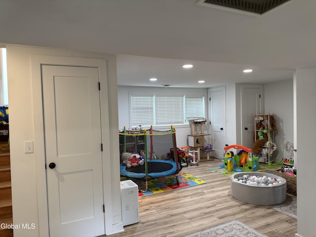 32 Winnie St, Albany, NY 12208 - game room featuring light wood finished floors and recessed lighting
