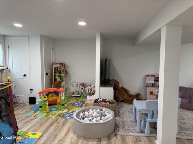 32 Winnie St, Albany, NY 12208 - recreation room with wood finished floors and recessed lighting