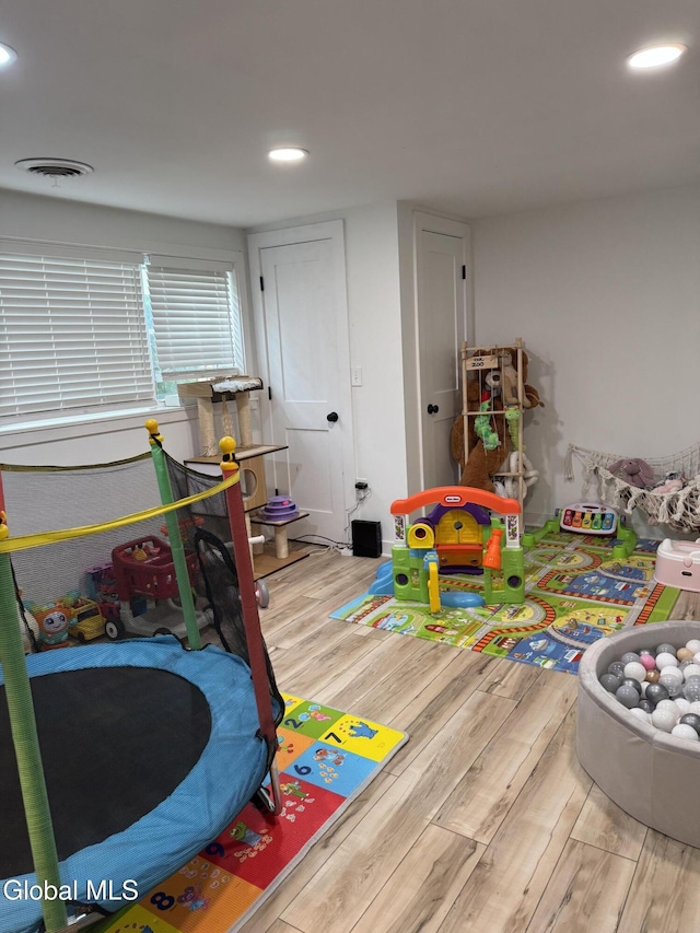 32 Winnie St, Albany, NY 12208 - game room with wood finished floors and recessed lighting