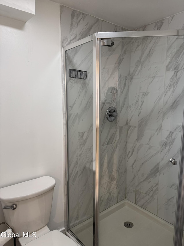 32 Winnie St, Albany, NY 12208 - bathroom featuring a shower stall and toilet