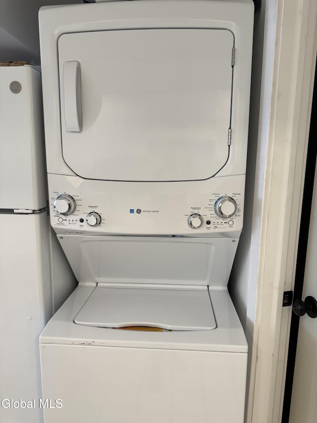 32 Winnie St, Albany, NY 12208 - laundry area with stacked washer and clothes dryer