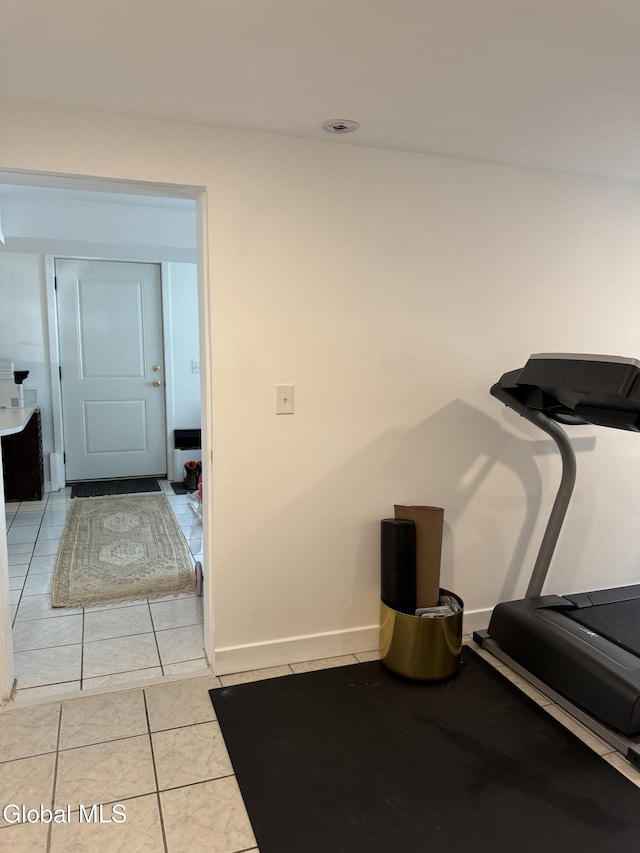 32 Winnie St, Albany, NY 12208 - workout room with light tile patterned floors and baseboards