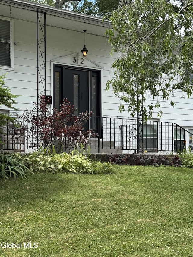 32 Winnie St, Albany, NY 12208 - entrance to property featuring a lawn