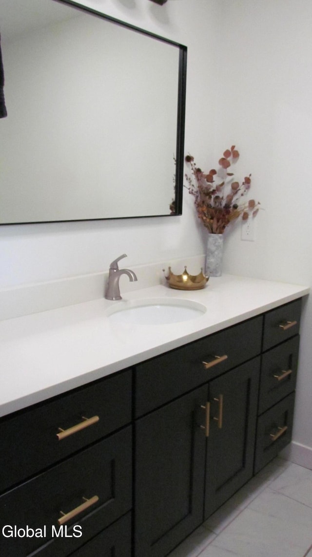 32 Winnie St, Albany, NY 12208 - bathroom with vanity and marble finish flooring