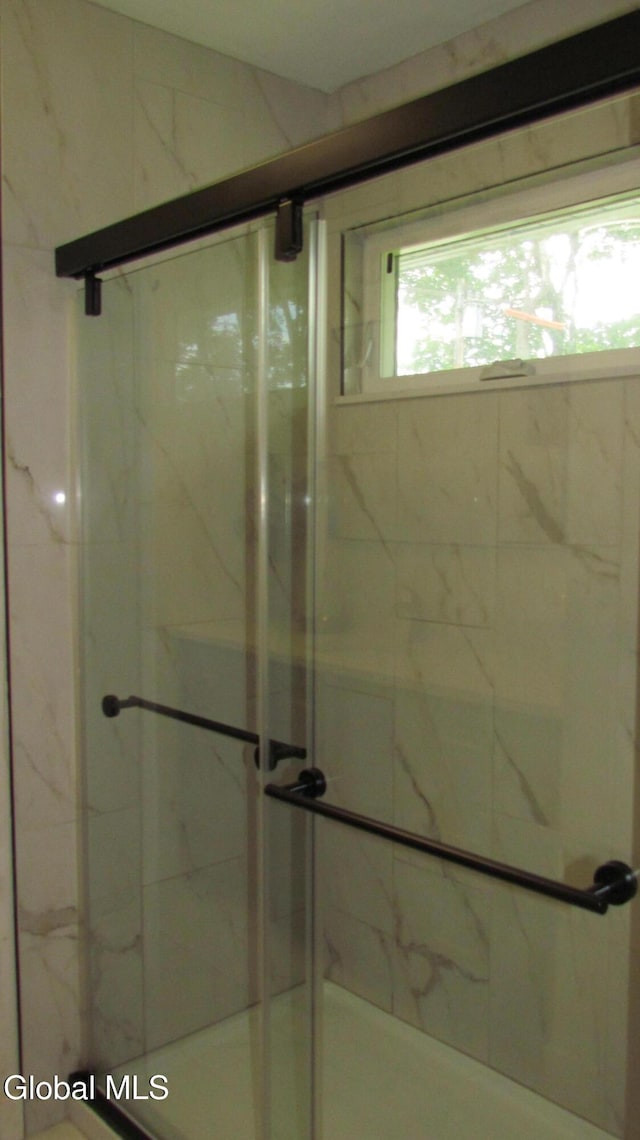 32 Winnie St, Albany, NY 12208 - bathroom featuring a marble finish shower