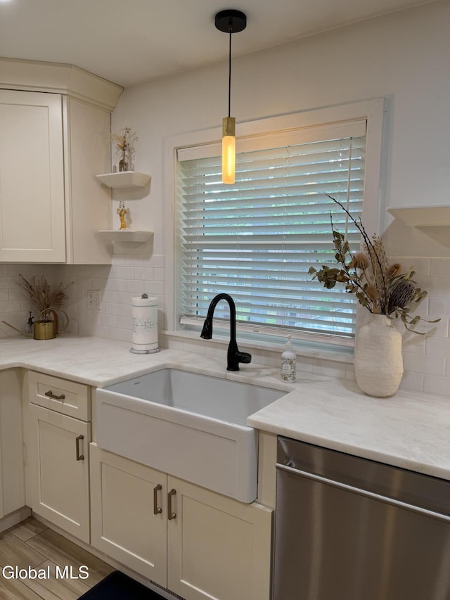 32 Winnie St, Albany, NY 12208 - kitchen featuring dishwasher, decorative backsplash, pendant lighting, open shelves, and white cabinets