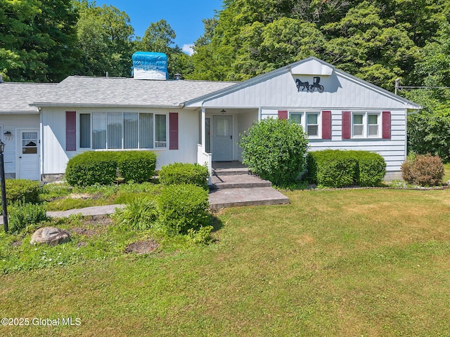 921 Altamont Voorheesville Rd, Altamont, NY 12009 - single story home with a chimney, a front yard, and roof with shingles